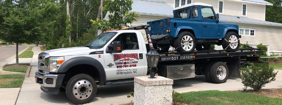 Antique vehicle towing service with flatbed leland NC Geocode: @34.2153851,-78.0160862